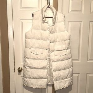 Long white puffy sleeveless jacket